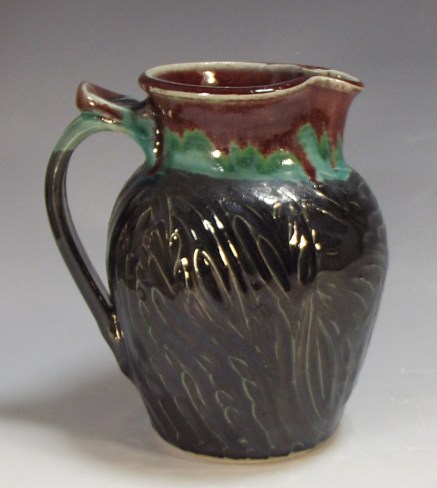 Small Carved Pitcher, Mid-Range Porcelaneous Stoneware 5” X 6” X 7”. 2015, $75  